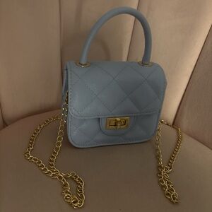 Elegant Blue Quilted Handbag with Gold Chain